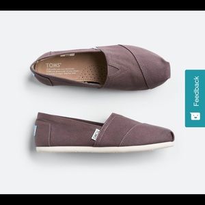 Brown canvas Toms shoes